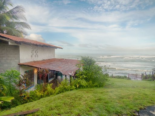 house overlooking a morning jungle beach